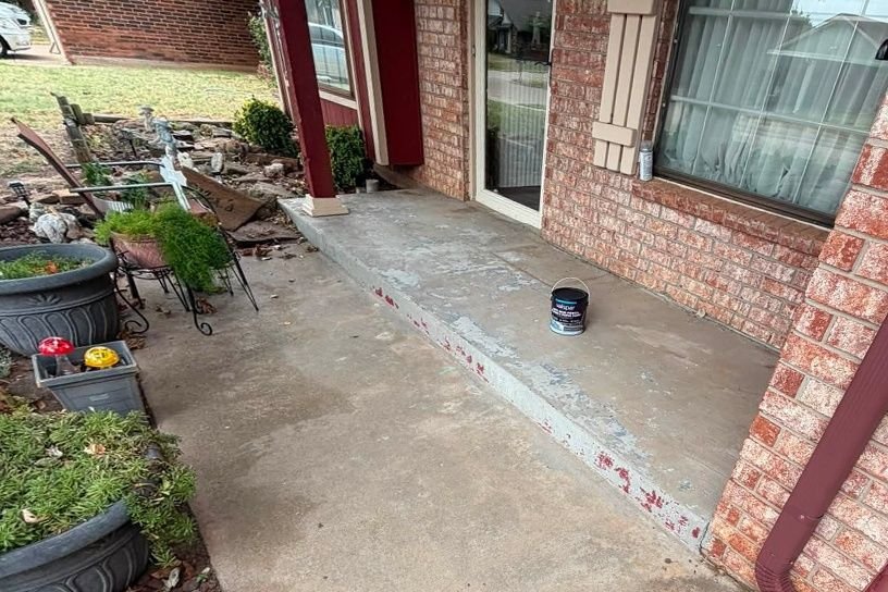 Before: front porch with worn, peeling paint