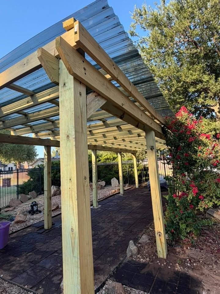 Before: bare, unstained pergola lumber